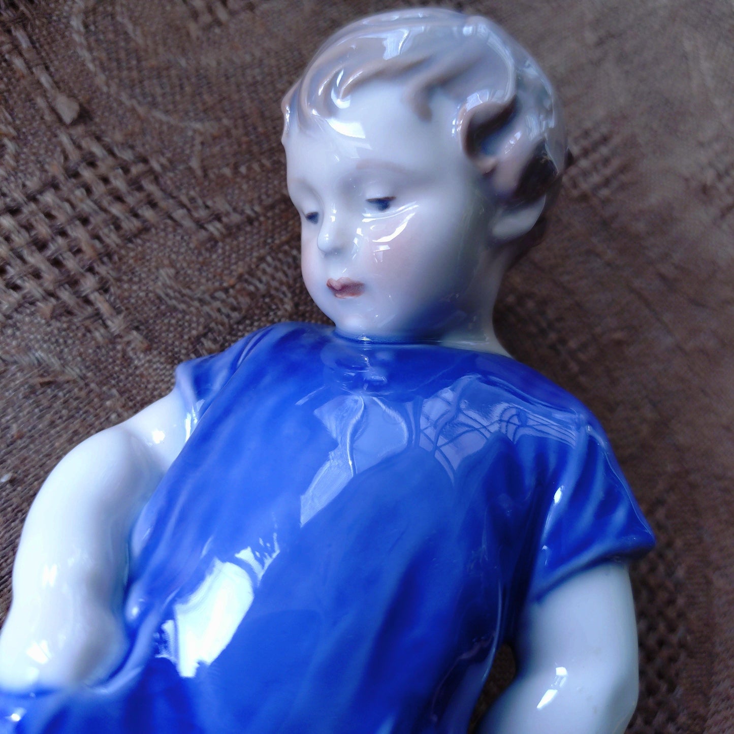 The boy with the Royal Copenhagen teddy bear is approximately 18.5 cm (H).