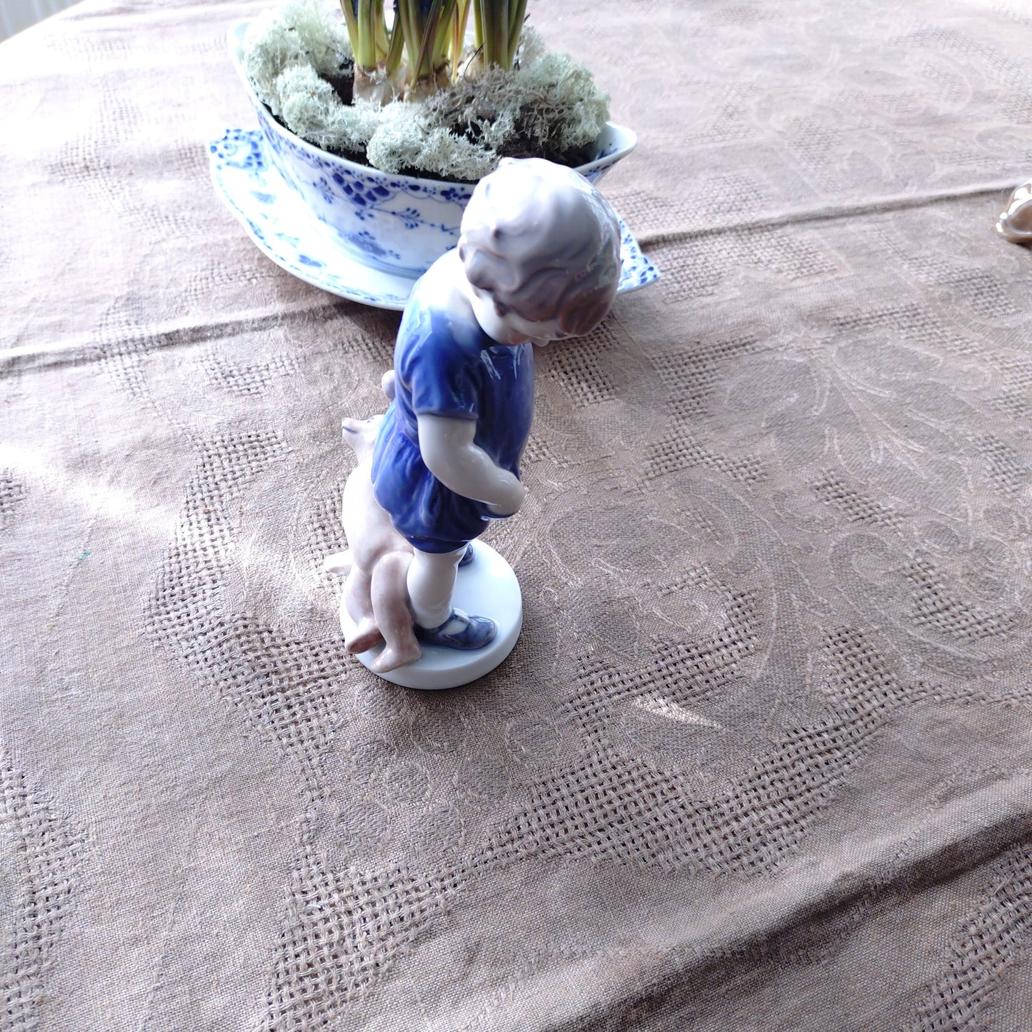 The boy with the Royal Copenhagen teddy bear is approximately 18.5 cm (H).