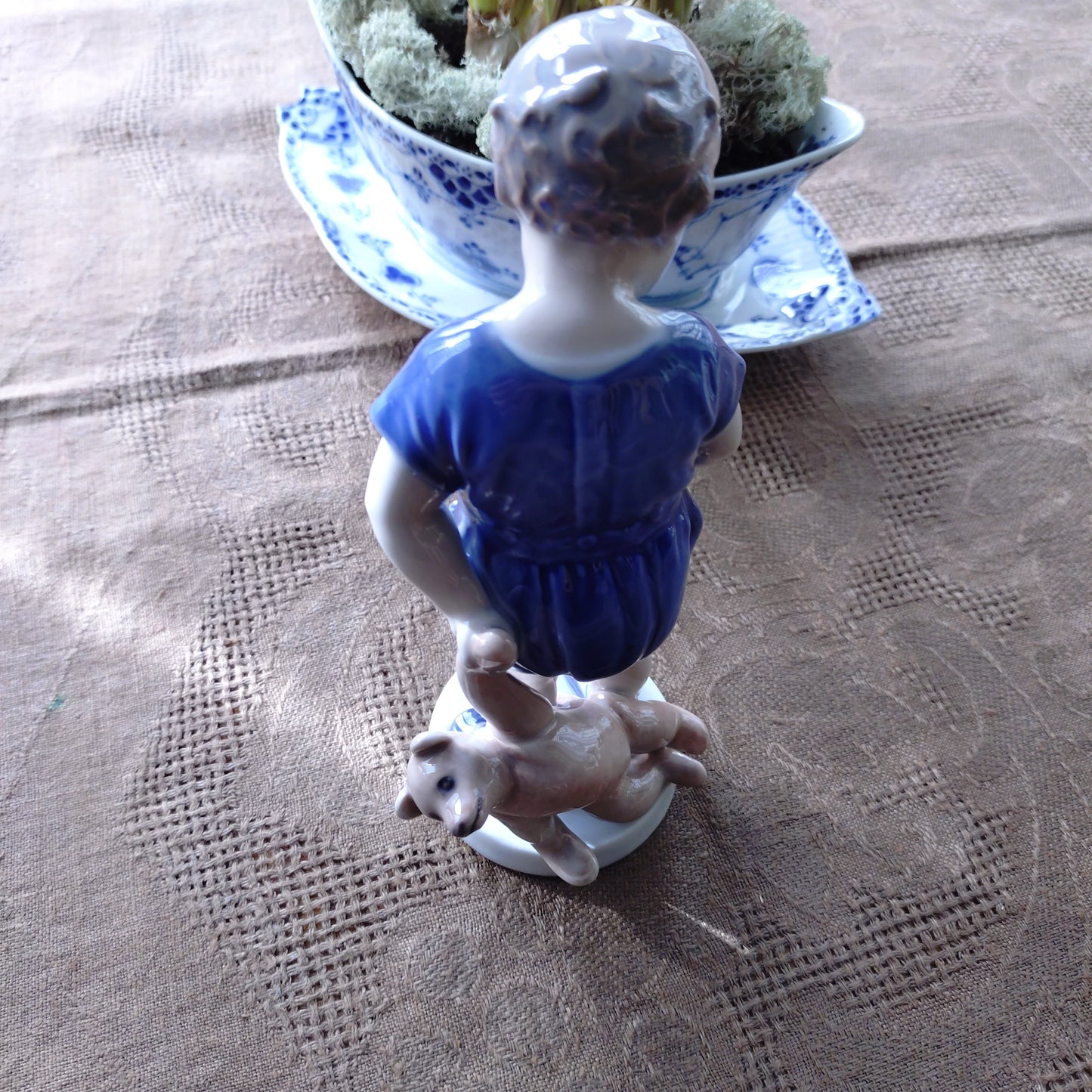 The boy with the Royal Copenhagen teddy bear is approximately 18.5 cm (H).
