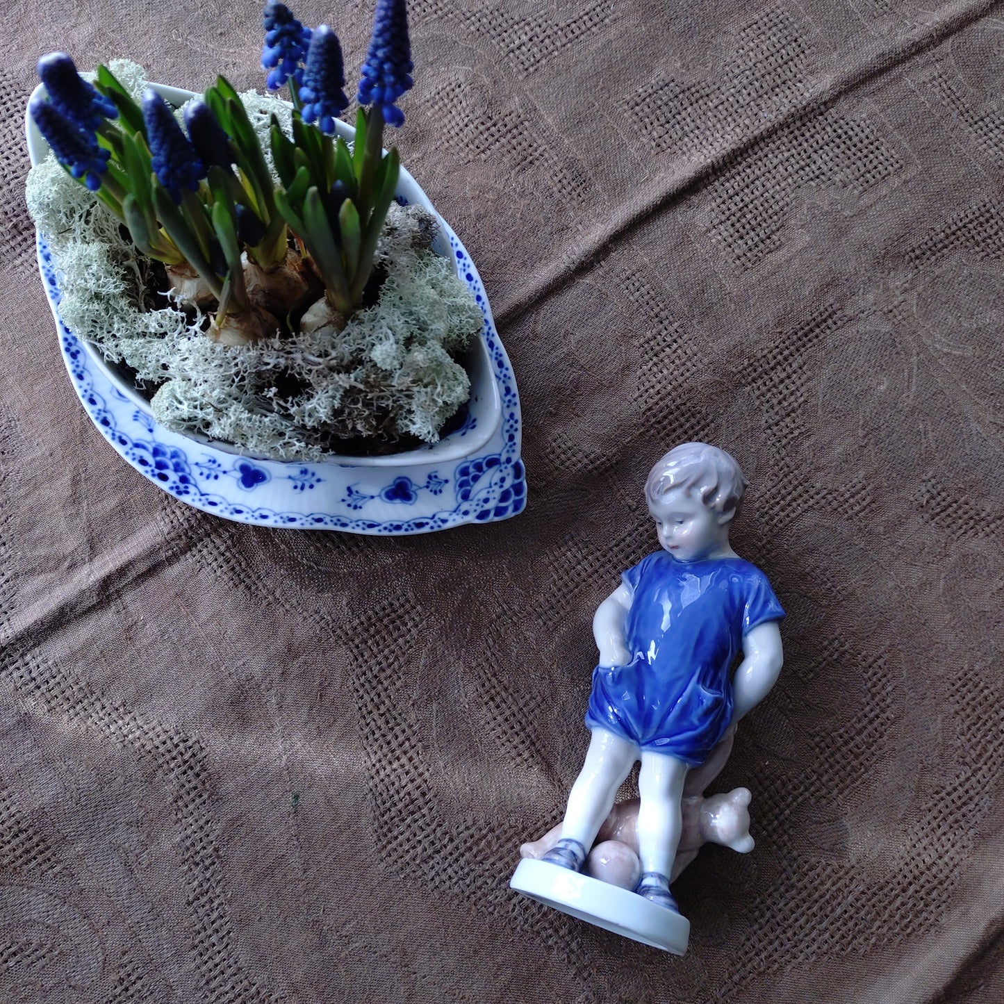 The boy with the Royal Copenhagen teddy bear is approximately 18.5 cm (H).