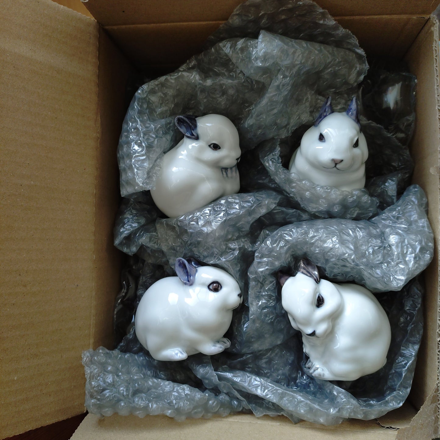 🐰Royal Copenhagen, Young Rabbit, Jeanne Grut design, approximately 7.5 cm (H) in height, model number 251, grooming its hind leg. Fits in the palm of your hand.